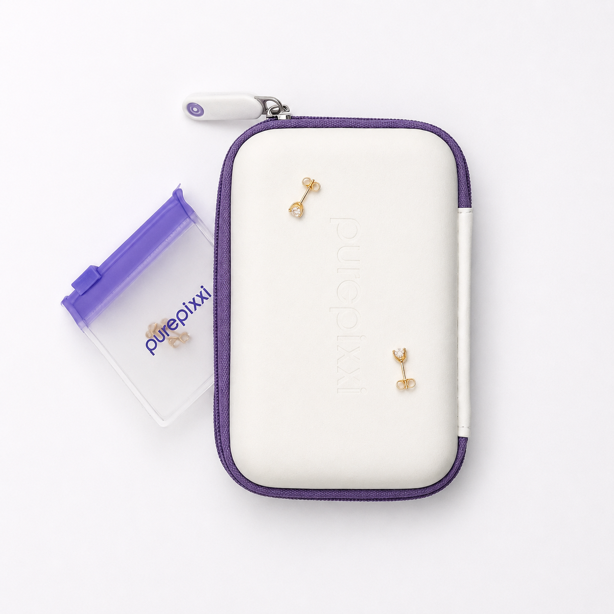 purepixxi Jewelry Case, closed white hard-shell with purple zip, shown with two gold crystal stud earrings and a storage pouch