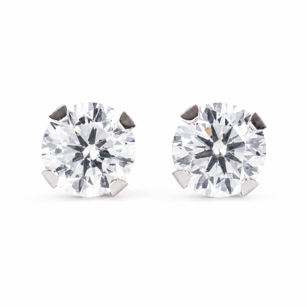 Pair of 4mm Flawless Crystal studs in polished S316L surgical steel, purepixxi children's earrings