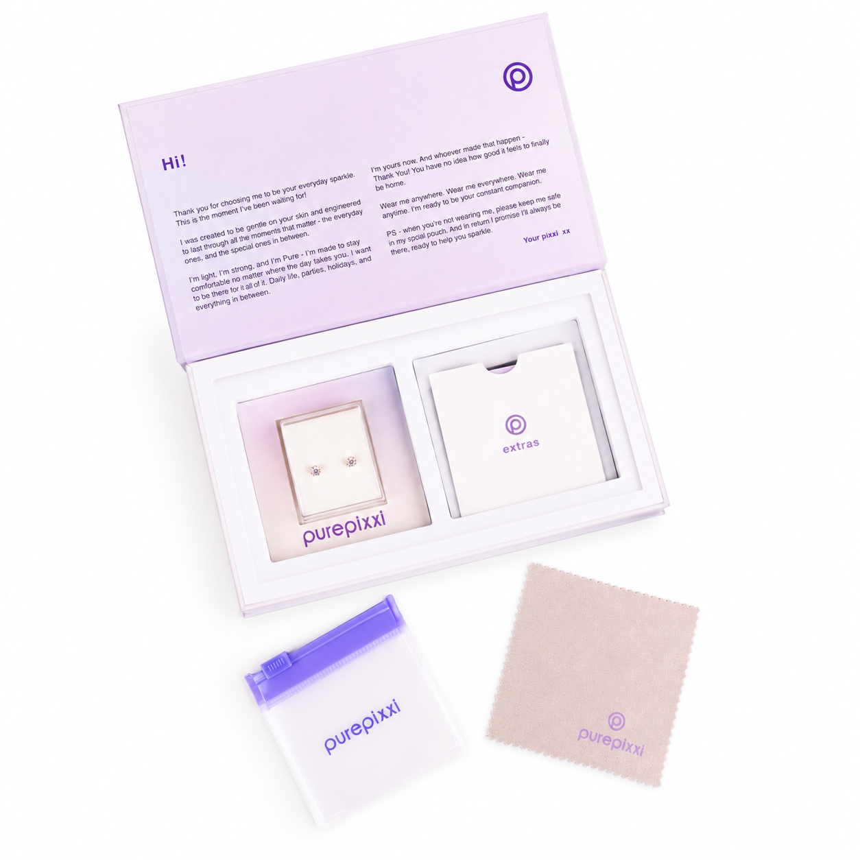 purepixxi earrings gift box opened, showing the welcome card, earrings, storage pouch and polishing cloth for young ears